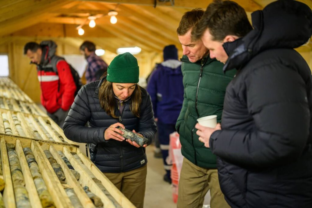 Workers Inspecting Core Samples