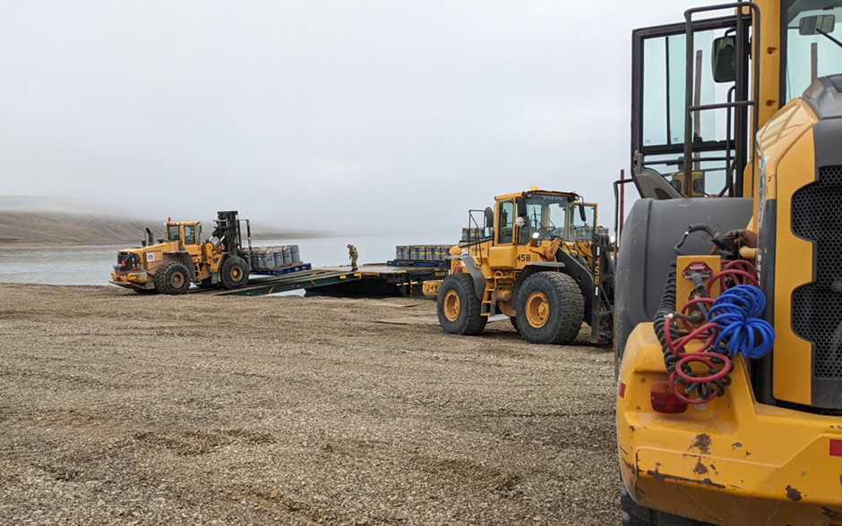 Figure 6: Offloading of cargo at the Storm Project Marine Loading Area (MLA), on the coast of Aston Bay, Nunavut.
