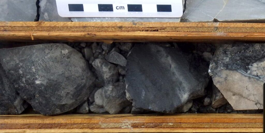 Figure 10: Chalcocite (metallic and dark grey) breccia in drill hole ST23-01 from the 4100N Zone. The interval shown is approximately 58m downhole.