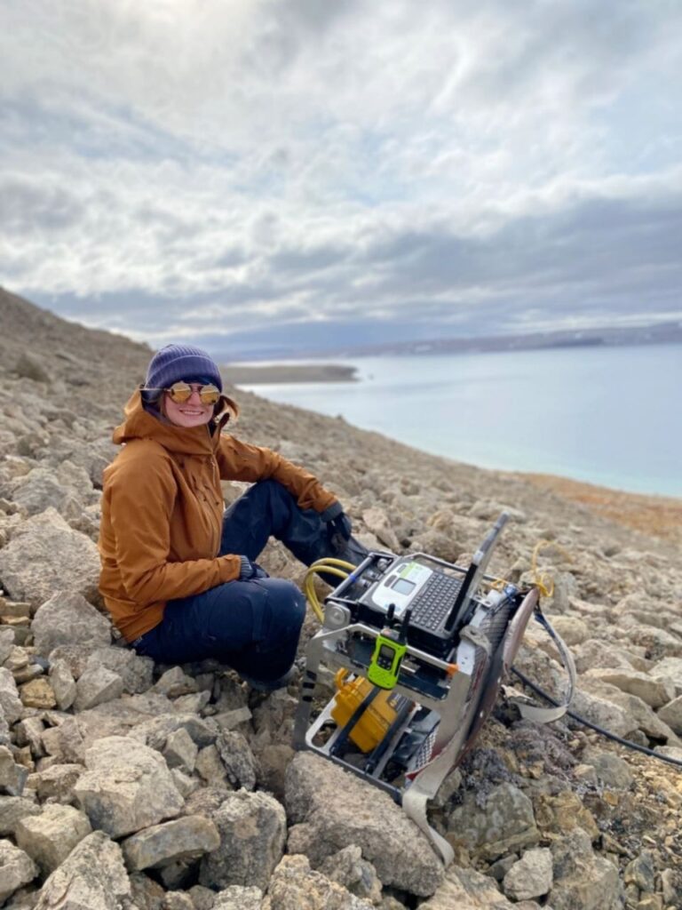 Figure 1: Electromagnetic survey field crew taking sensor readings.