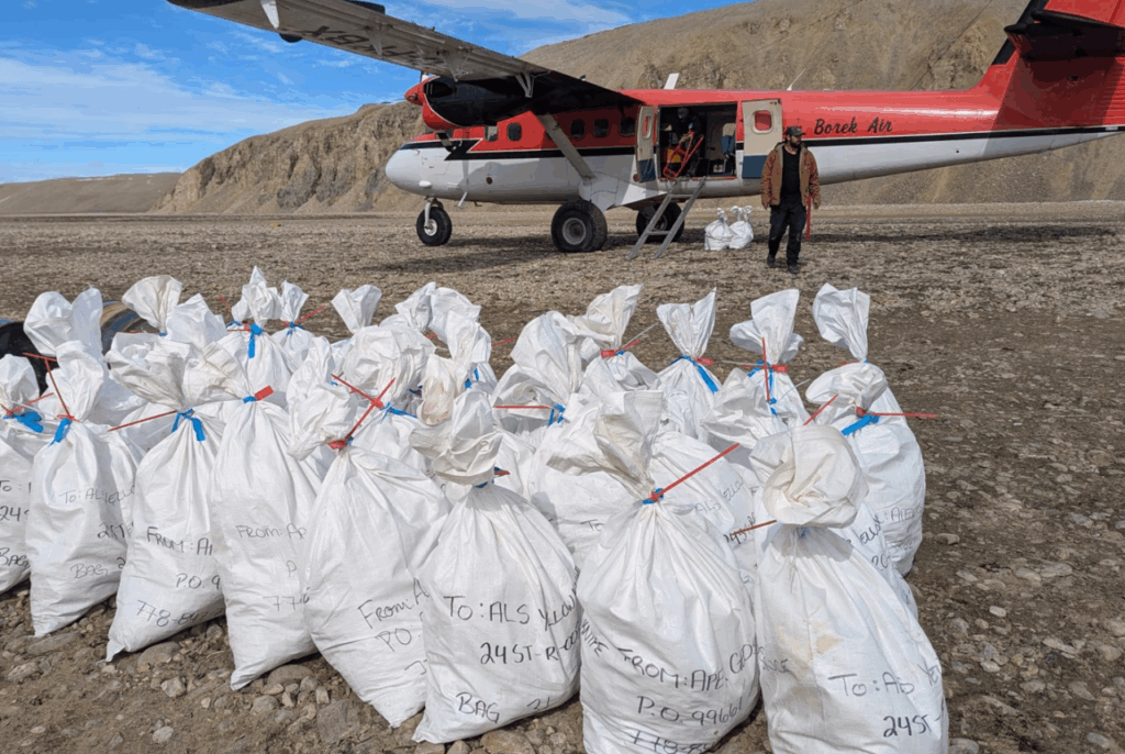 Figure 1: Reverse Circulation (RC) drill samples at the Storm Project, Nunavut, being loaded for their journey to the laboratory in Yellowknife for processing.