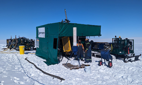 Figure 1: Reverse Circulation (RC) drilling with the track-mounted rig underway at Cyclone North, Storm Project, Nunavut.