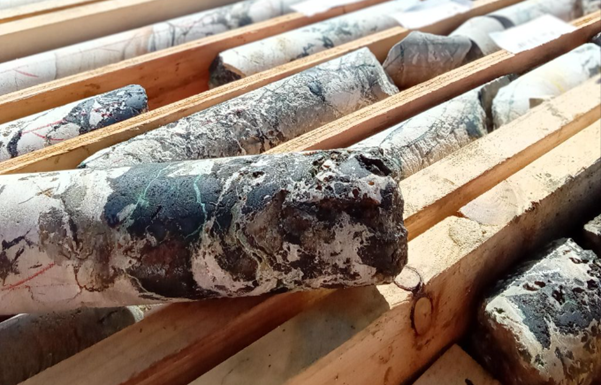 Figure 1: Diamond drill core from drill hole PFS-002. The core is from approximately 74m downhole and contains semi-massive visual chalcocite (dark grey mineral) within dolomite host rock (light grey). This interval has not yet been assayed.

