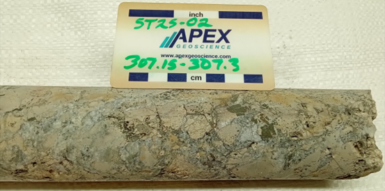Figure 3: Dense breccia and fracture fill visual pyrite and chalcopyrite from ST25-02 (307.15-307.3m downhole). Assays for this interval are pending (see below visual estimates disclaimer).

