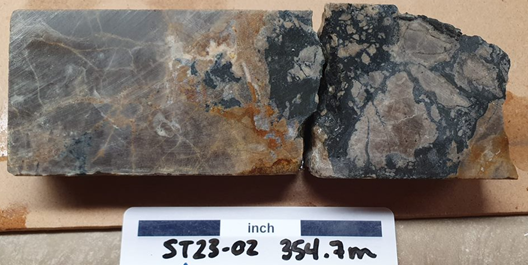 Figure 5: Chalcocite (dark grey) breccia fill in drill hole ST23-02 from approximately 354.7m downhole.